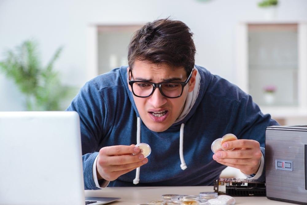 A scammed person in front of a computer