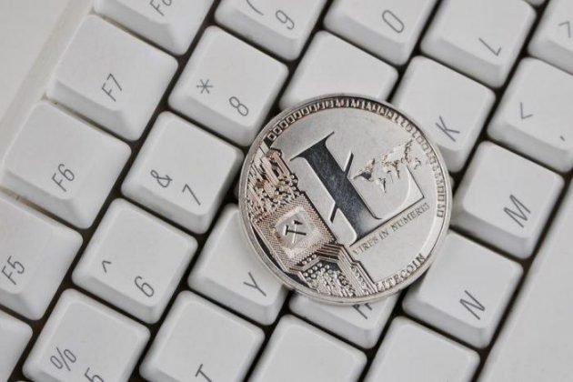 Physical Litecoin on a keyboard