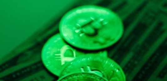 bitcoins in green background