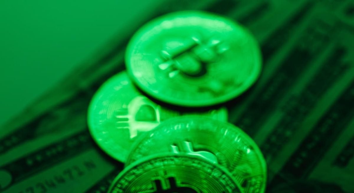 bitcoins in green background